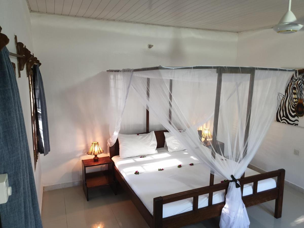 Nungwi Inn Beach Cottages Vertshus